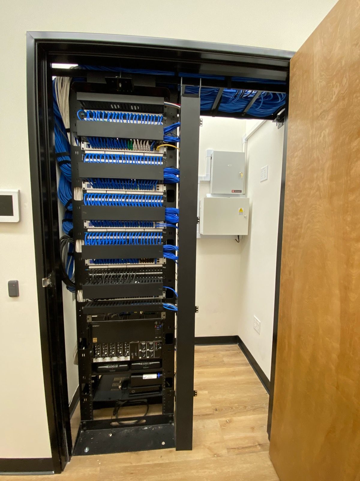 Structured network rack and protected cabling serving a healthcare office