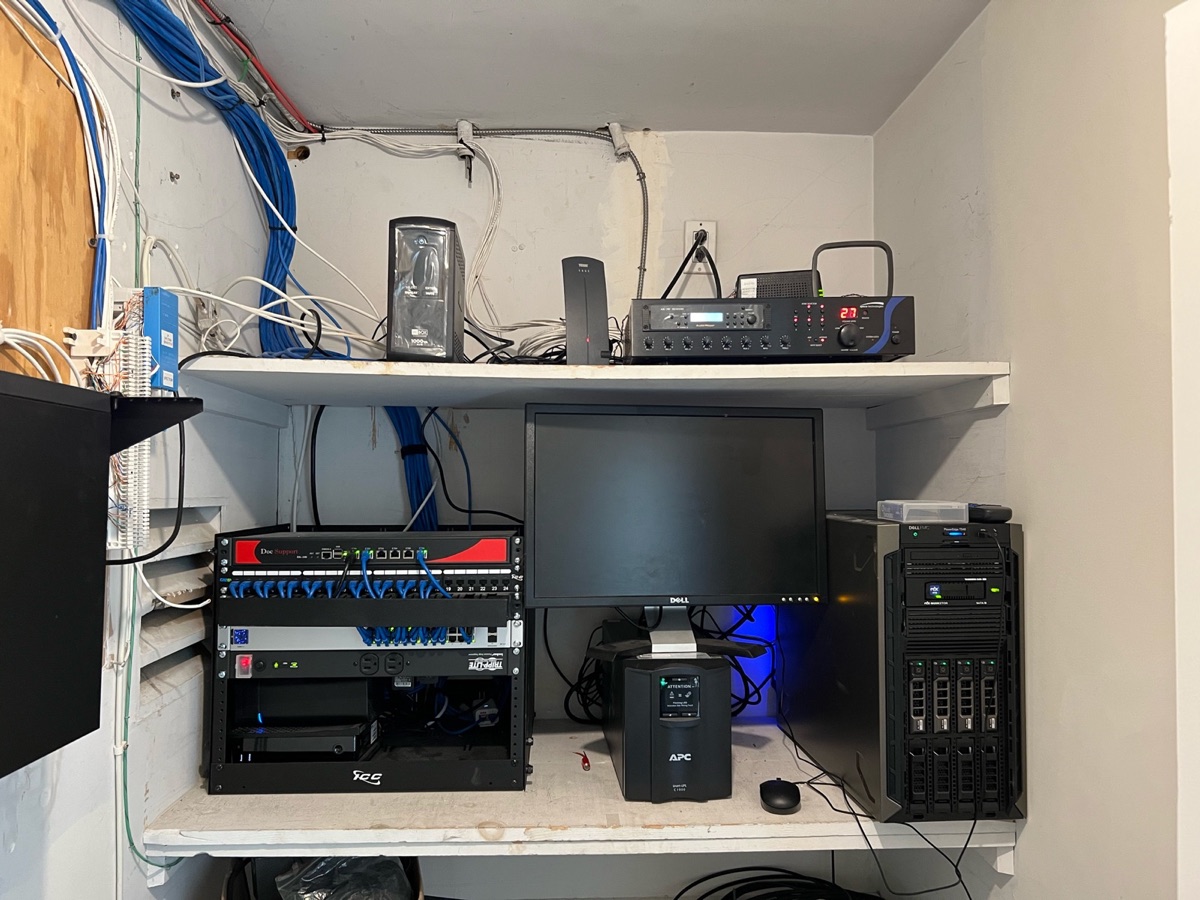 Business network, server, switching, and backup infrastructure installed in a commercial equipment room