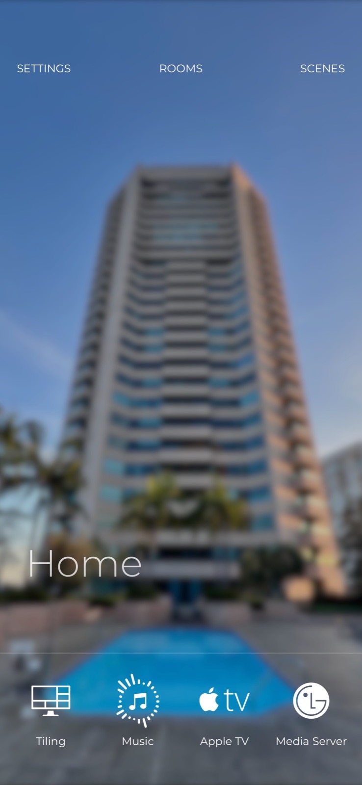 Savant app home screen showing rooms, scenes, music, and media controls
